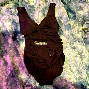 I’m selling a bathing suit the brand is time and tru it’s a size small (4-6)